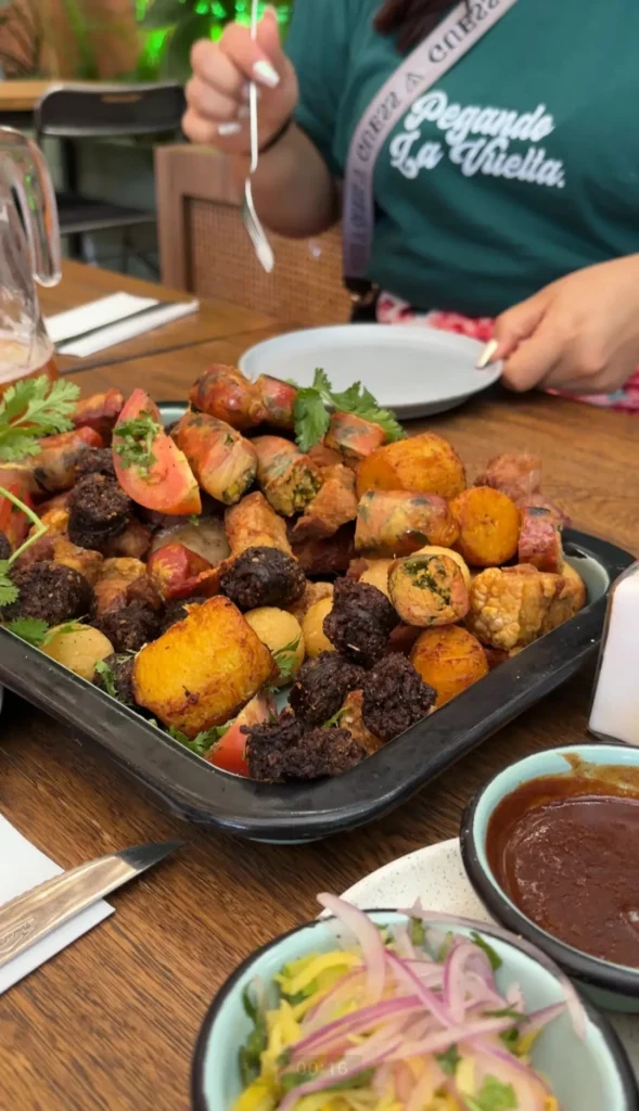 Traditional Colombian bandeja paisa food spread at a restaurant in Colombia